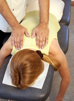 Chiropractic adjustments feel great. Chiropractor adjusting patient
